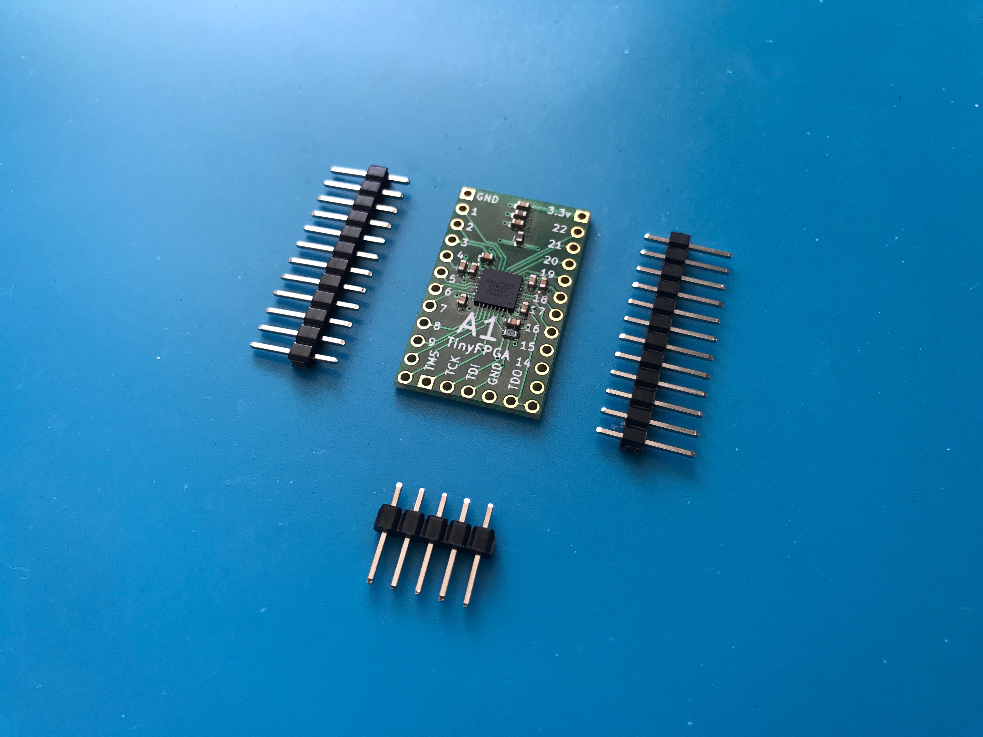 TinyFPGA A1 next to pins